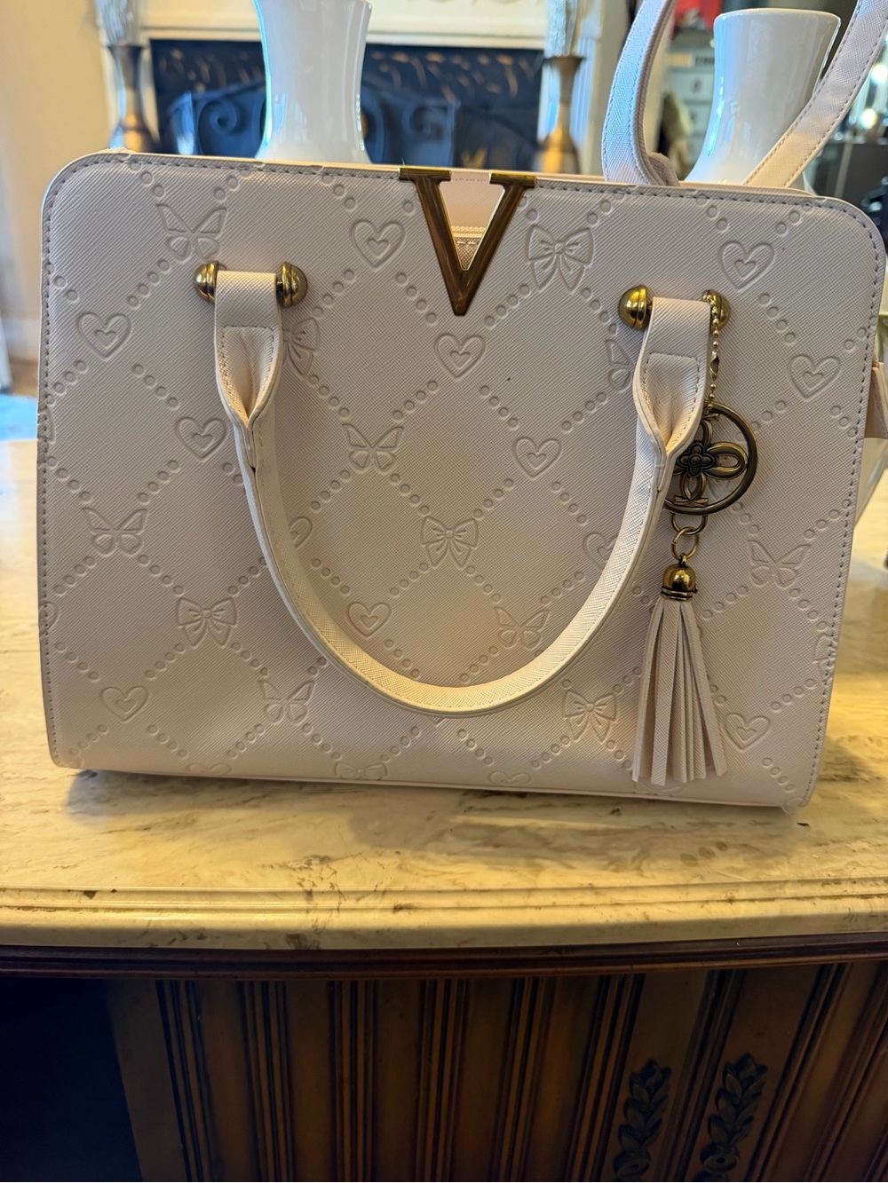 Elegant White Tote Bag with Tassel Charm
